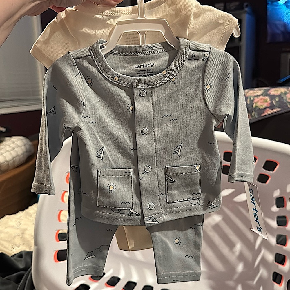 New with tags carters newborn outfit.